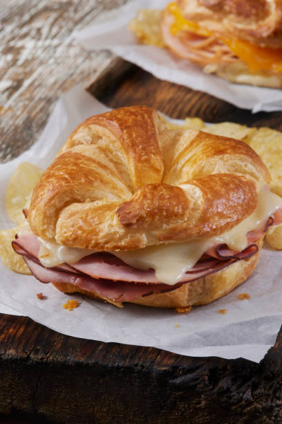 istock Baked Ham and Swiss Cheese Croissant Sandwich 1395413929