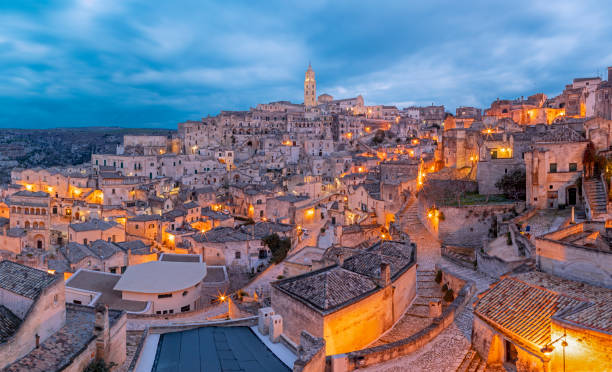 istock Matera - The cityscape at dusk. 1395416460