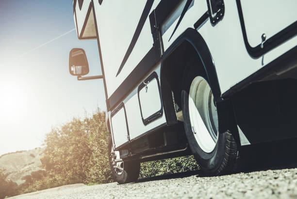 istock Recreational Class C Motorhome on the Side of a Road 1395416721