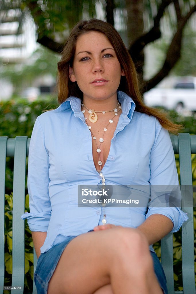 Girl on a park bench Adult Stock Photo