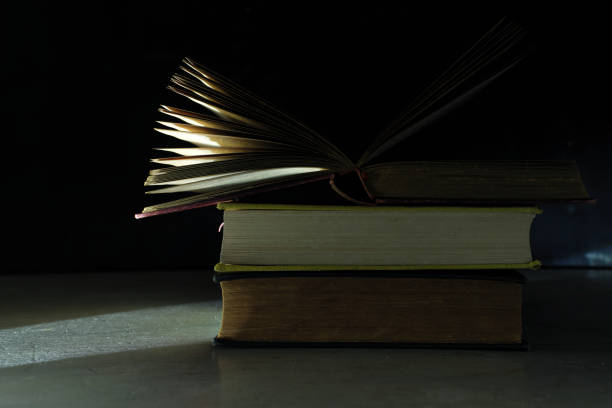 istock open book on a stack of books, reading, education, education concept,  free copy space 1395417954