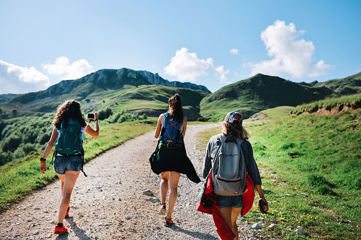 Group of women on a hiking trip through the mountains in Dinaric Alps, Southeastern Europe.