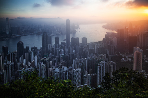Dawn view of Victoria Harbor and Hong Kong cityscape from Victoria Peak