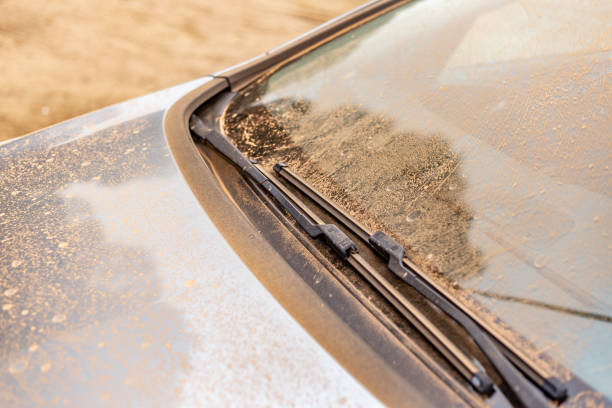Car windshield covered with Saharan dust. Rain of mud from the Sahara desert Madrid, Spain. March 15 2022. Car windshield covered with Saharan dust. Rain of mud from the Sahara desert desert wash stock pictures, royalty-free photos & images
