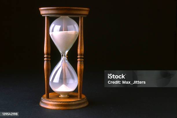Hourglass Stock Photo - Download Image Now - Black Background, Hourglass, Antique