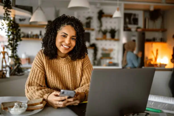 Photo of Portrait of young cute mixed race woman at home