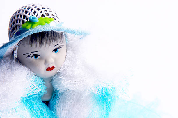 Bambola viso su sfondo bianco - foto stock