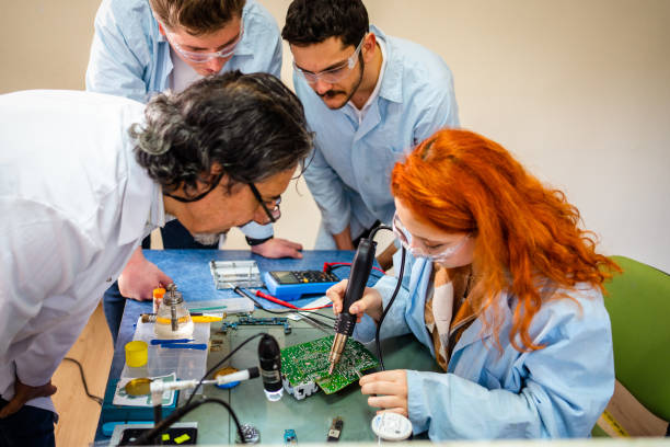 istock Group of young people in technical vocational training with teacher 1395428745