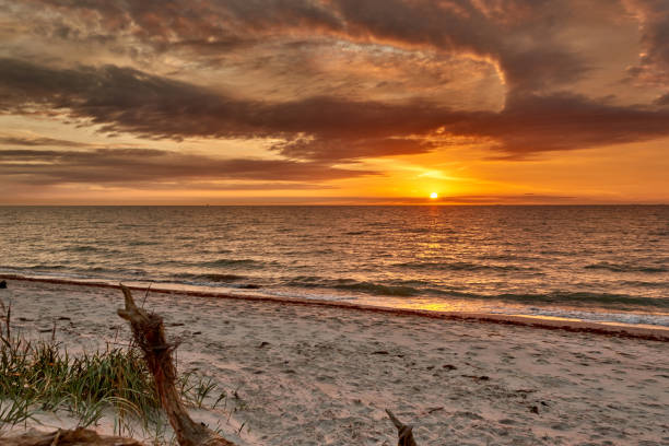 istock sunset at baltic sea vibrant scenery 1395428990