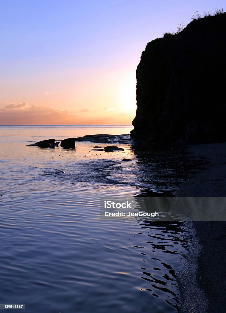 Sonnenuntergang hinter Klippe, Kimmeridge Bay - Lizenzfrei Abenddämmerung Stock-Foto
