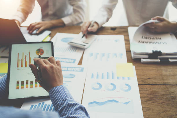 istock Partner meeting business investor working start up project for both company with document data graph, Professional Business teamwork conference project success financial statistics growth profit. 1395436157