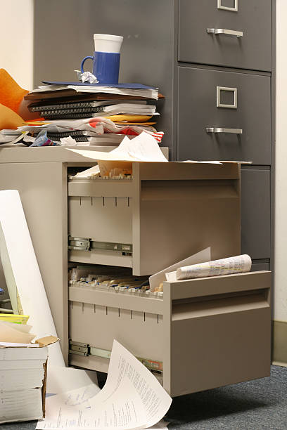 istock Messy Filing Cabinet - portrait version 139543892