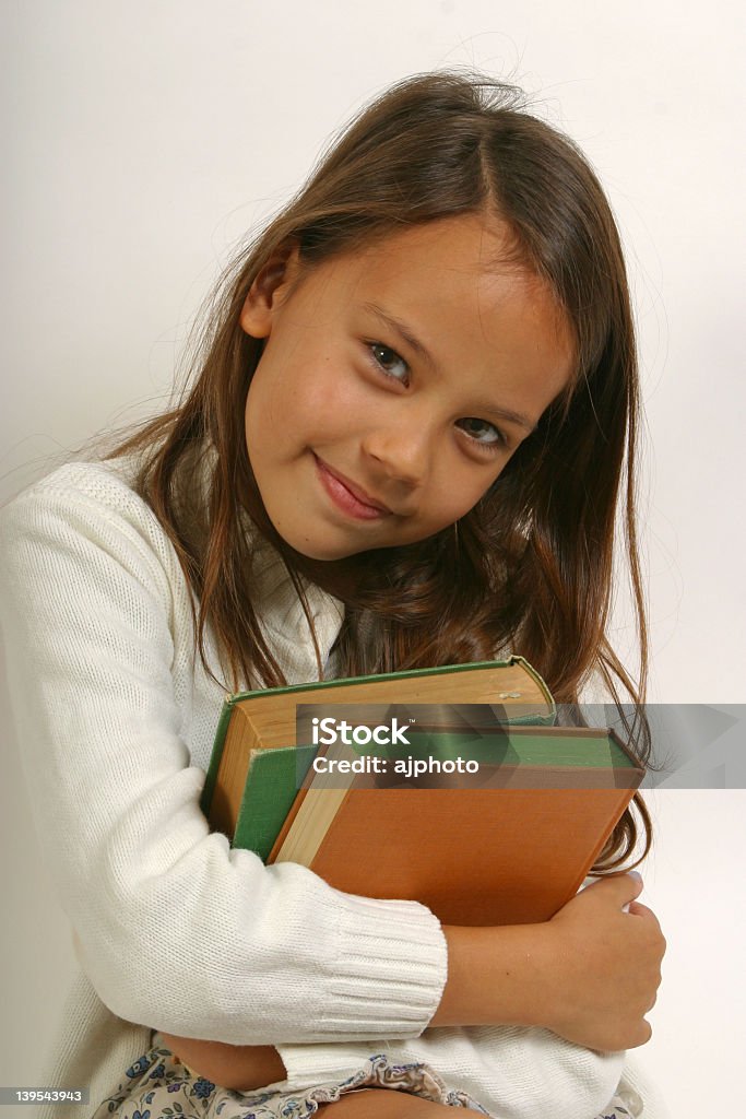 Chica con libros - Foto de stock de Abrazar libre de derechos