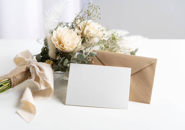 istock Dried flower bouquet and blank message card placed on white background. 1395439609