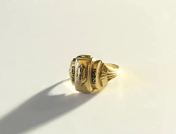 High School class ring, 1952, isolated on white background