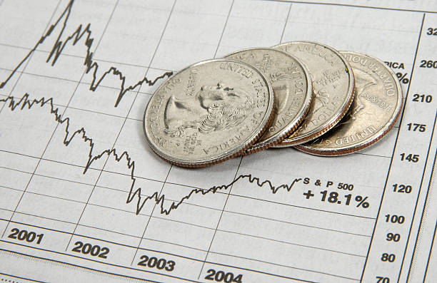 istock Stock market performance chart with nickels laid on top 139544268