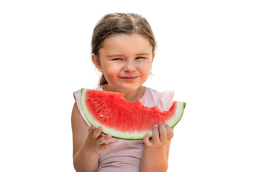 Happy child girl with watermelon bite isolated on white background