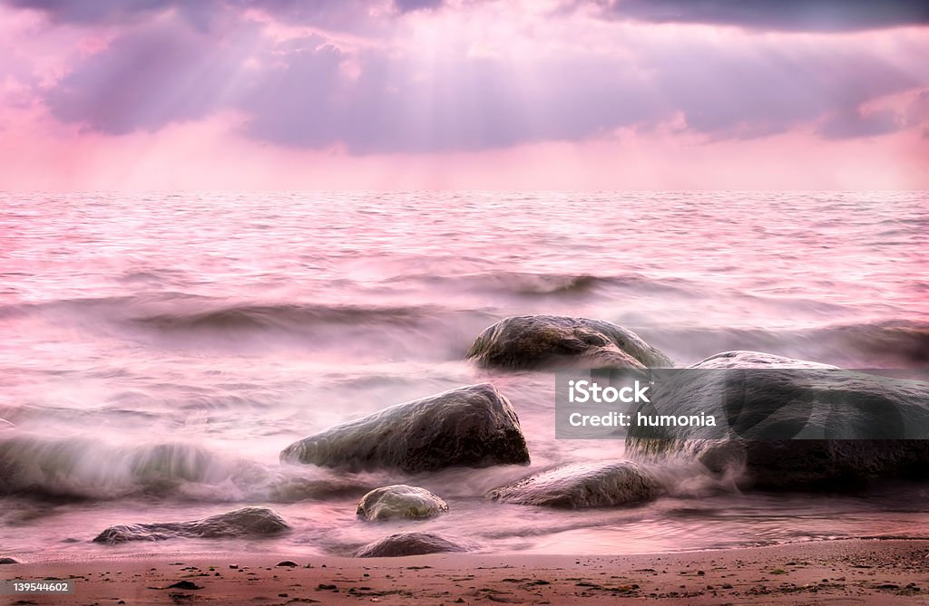 Pink Sea A beautiful sea. Beach Stock Photo