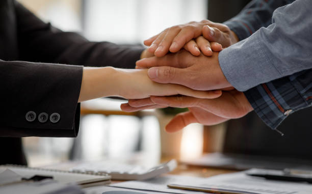 istock Business people shaking hands, 1395448495