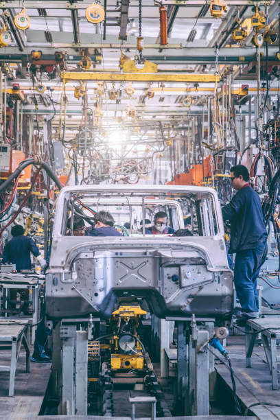 Workers in an automoble factory in Beijing,China.