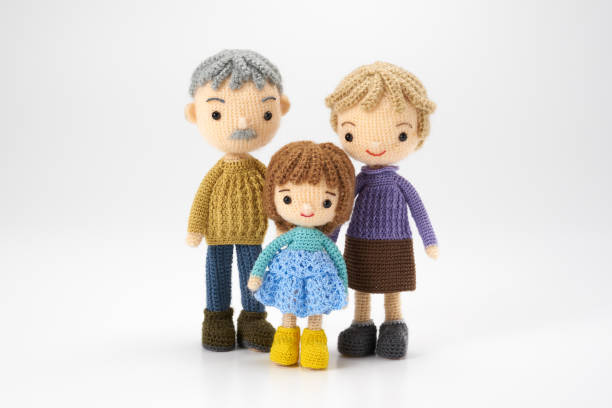 istock Small and cute Amigurumi doll on white background 1395451280