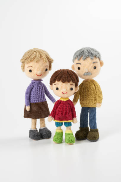 istock Small and cute Amigurumi doll on white background 1395451285