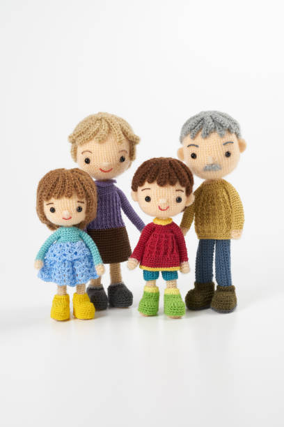 istock Small and cute Amigurumi doll on white background 1395451292