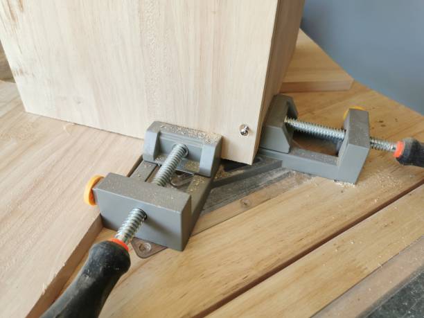 istock Use corner clamps to work with wood 1395451322