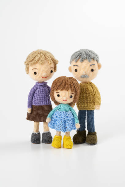 istock Small and cute Amigurumi doll on white background 1395451323