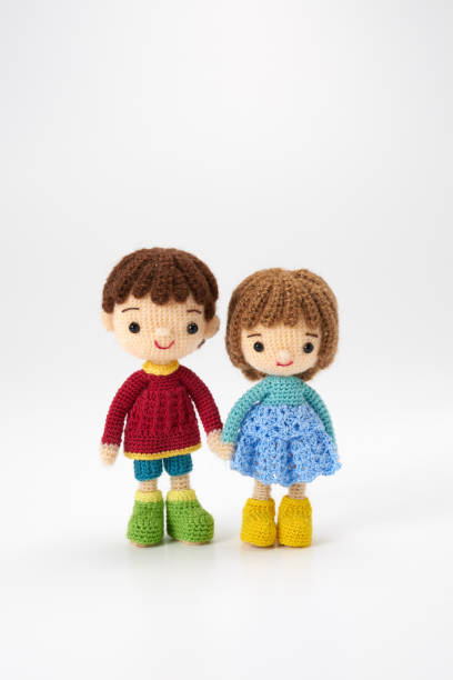 istock Small and cute Amigurumi doll on white background 1395451334