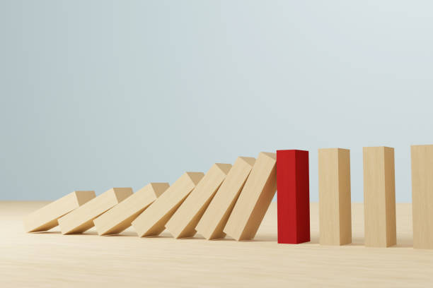 risk management concept. wooden block stopping domino effect for business. 3d render illustration - risk management imagens e fotografias de stock