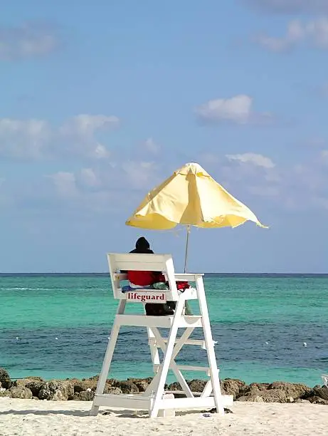 Lifeguard on duty at a tropical beach.