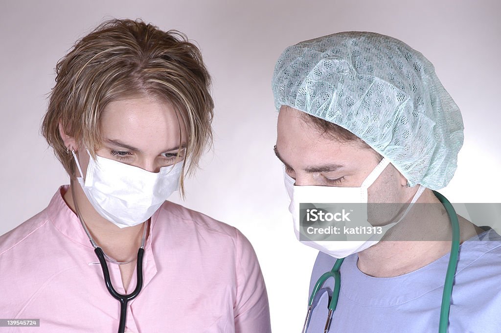 Chirurg i pielęgniarka 3 - Zbiór zdjęć royalty-free (Badanie lekarskie)