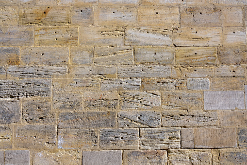 Stone wall showing much detail and texture