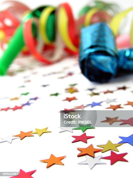 Noicemakers Streamers And Confetti Stock Photo - Download Image Now - Backgrounds, Celebration, Celebration Event