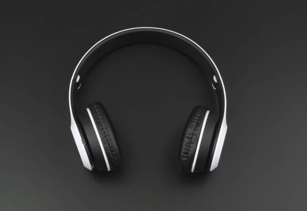 istock Wireless headphones on black background 1395467746