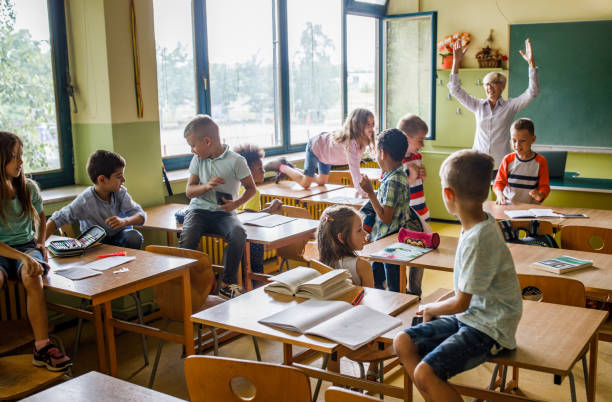 istock Chaos in the classroom of elementary school! 1395468683