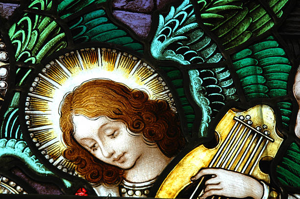 Beautiful stained glass window with a angel stock photo