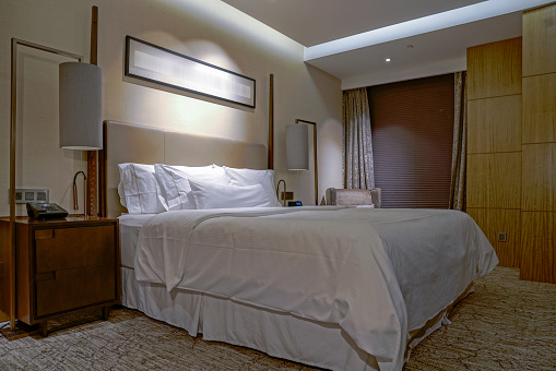 Elegant and comfortable home and hotel bedroom interior.