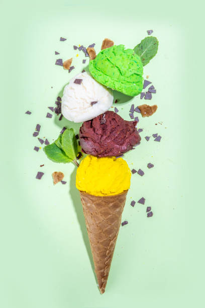 Colorful ice cream in waffle cones stock photo