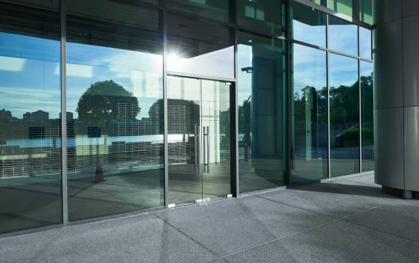 istock Modern glass wall facade office building 1395473467