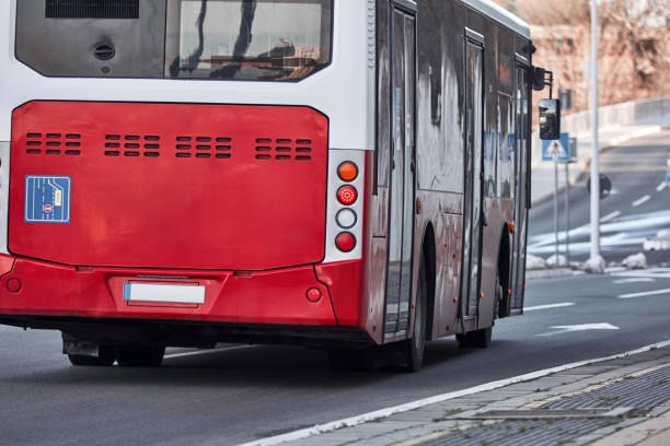 istock Public transportation bus in urban surroundings. 1395473706
