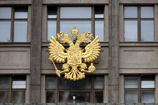 Double headed eagle on State Duma facade, concept of government and authorities