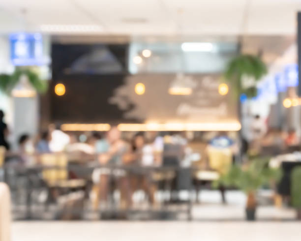 istock Blurry image of coffee shop or cafe restaurant interior background 1395474637