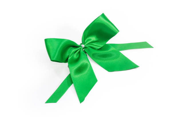 istock Top view of green satin bow-knot on white background 1395474908