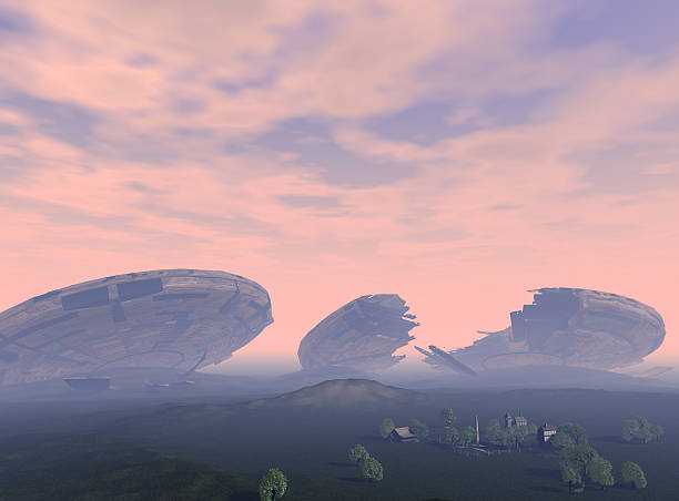 Giant wrecked saucer hulks loom on the horizon dwarfing a small village.