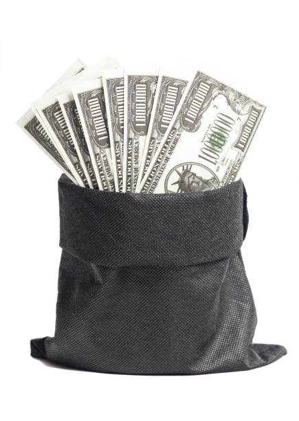 Money bag with one million dollars bills isolated on white.