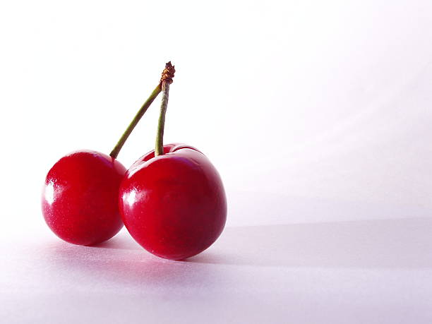 Hot Red Cherry Cherries With Stems stock photo