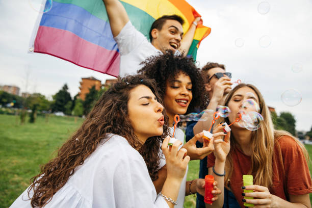istock Group of friends celebrates Pride Day together 1395490412