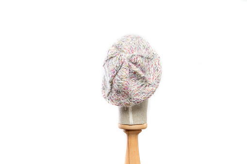 magenta knit hat/beanie with mannequin head on white background